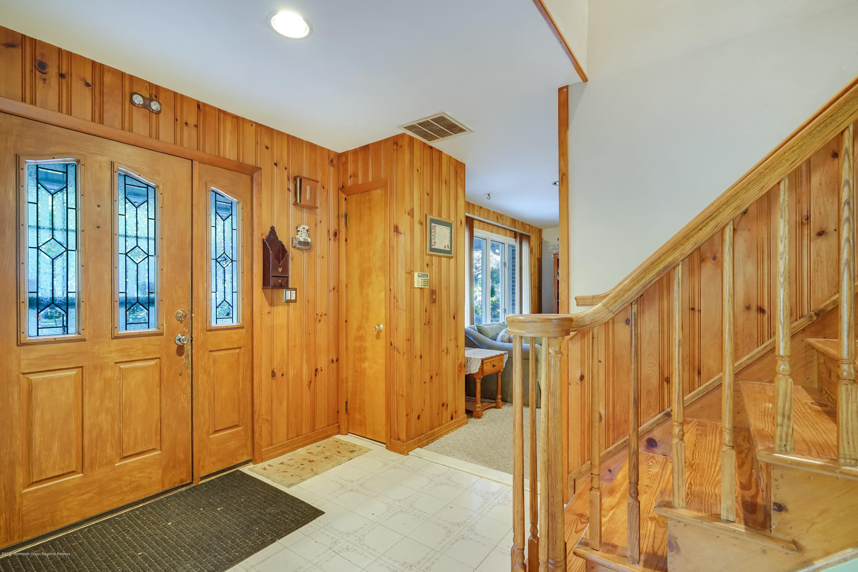 43 Korman Road Bayville, NJ 08721 - Photo 4 of 47 a view of a door with glass door