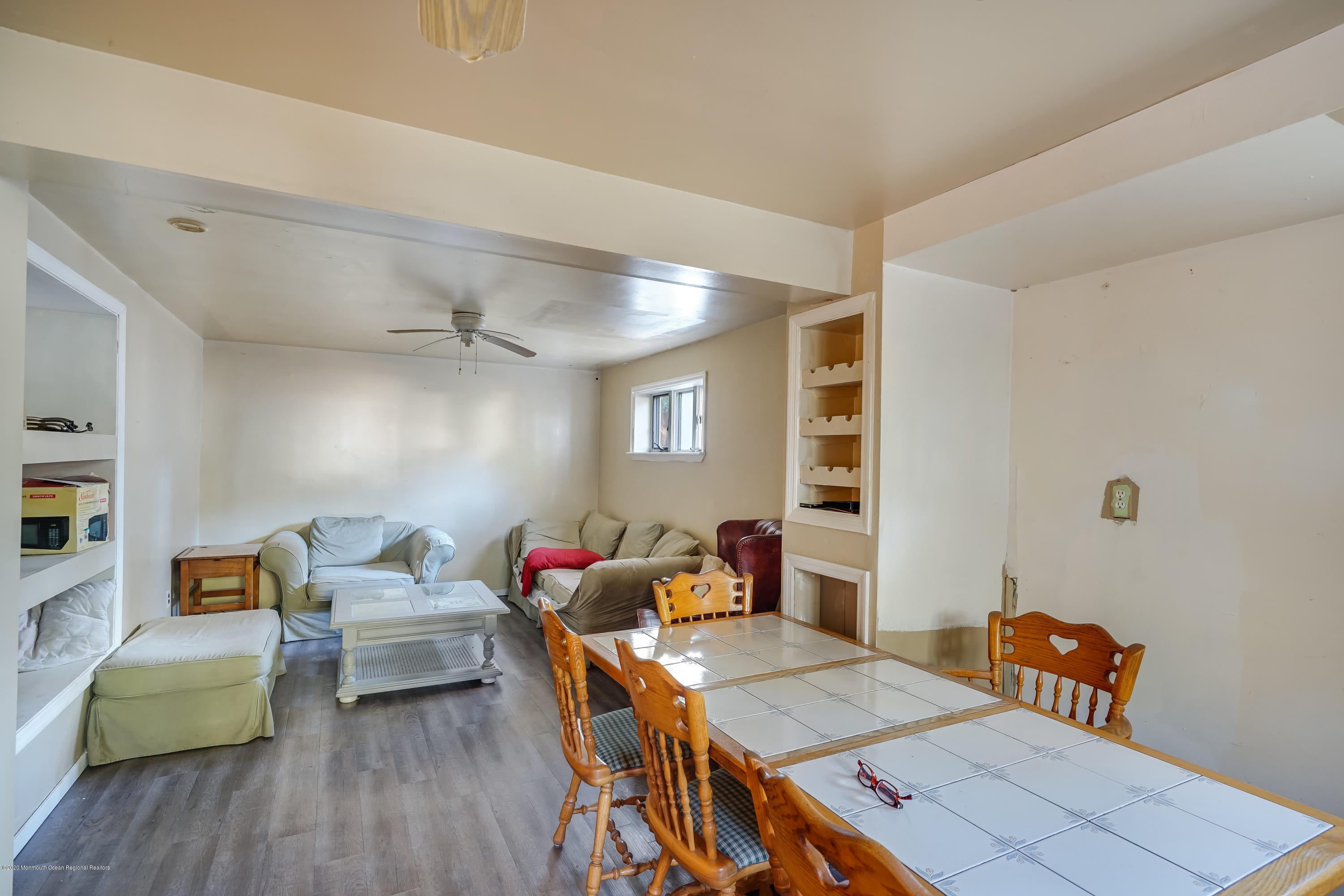 43 Korman Road Bayville, NJ 08721 - Photo 36 of 47 a living room with furniture and wooden floor