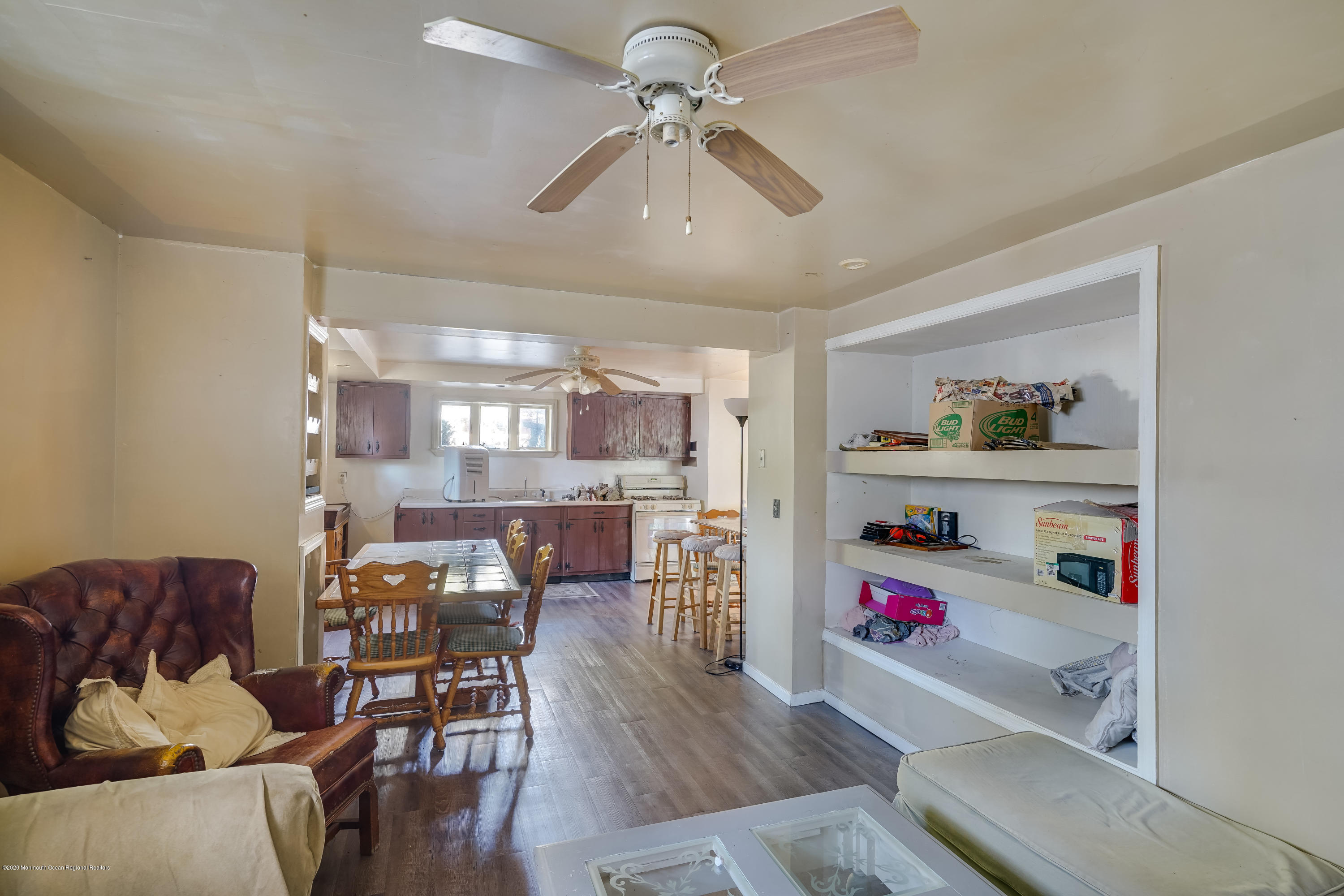 43 Korman Road Bayville, NJ 08721 - Photo 37 of 47 a living room with furniture and wooden floor
