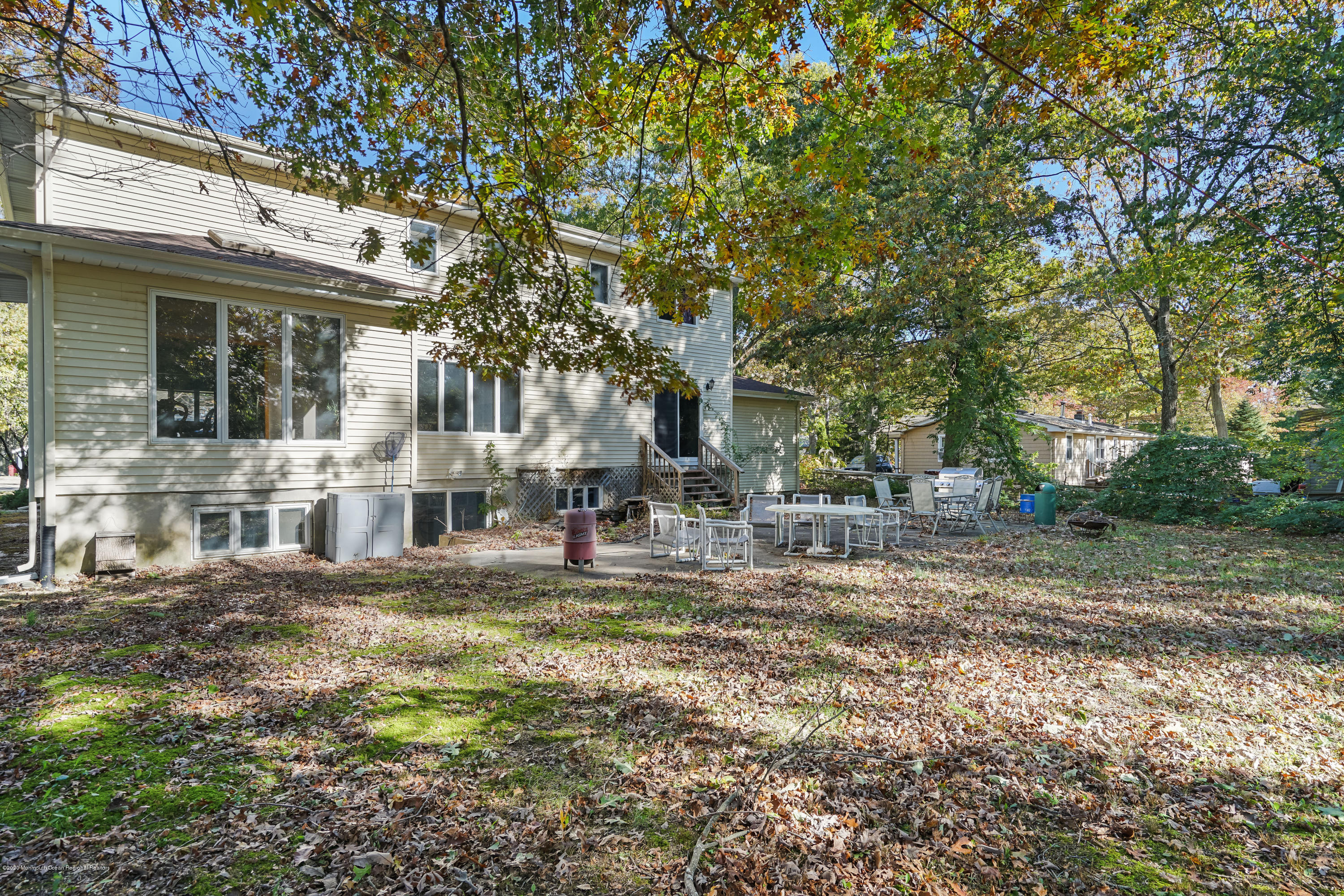 43 Korman Road Bayville, NJ 08721 - Photo 46 of 47 a view of a house with a yard