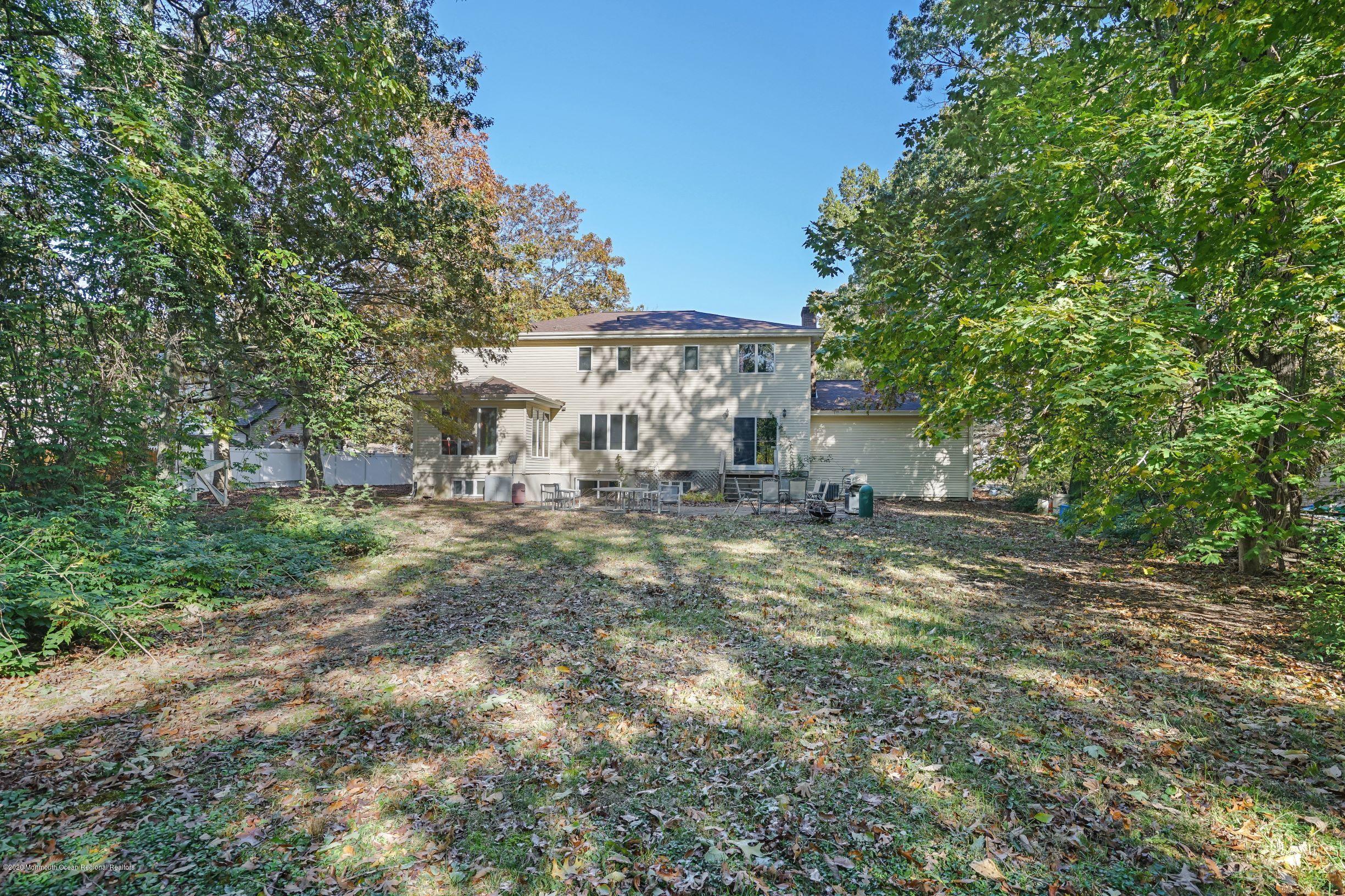 43 Korman Road Bayville, NJ 08721 - Photo 47 of 47 a view of a house with a yard