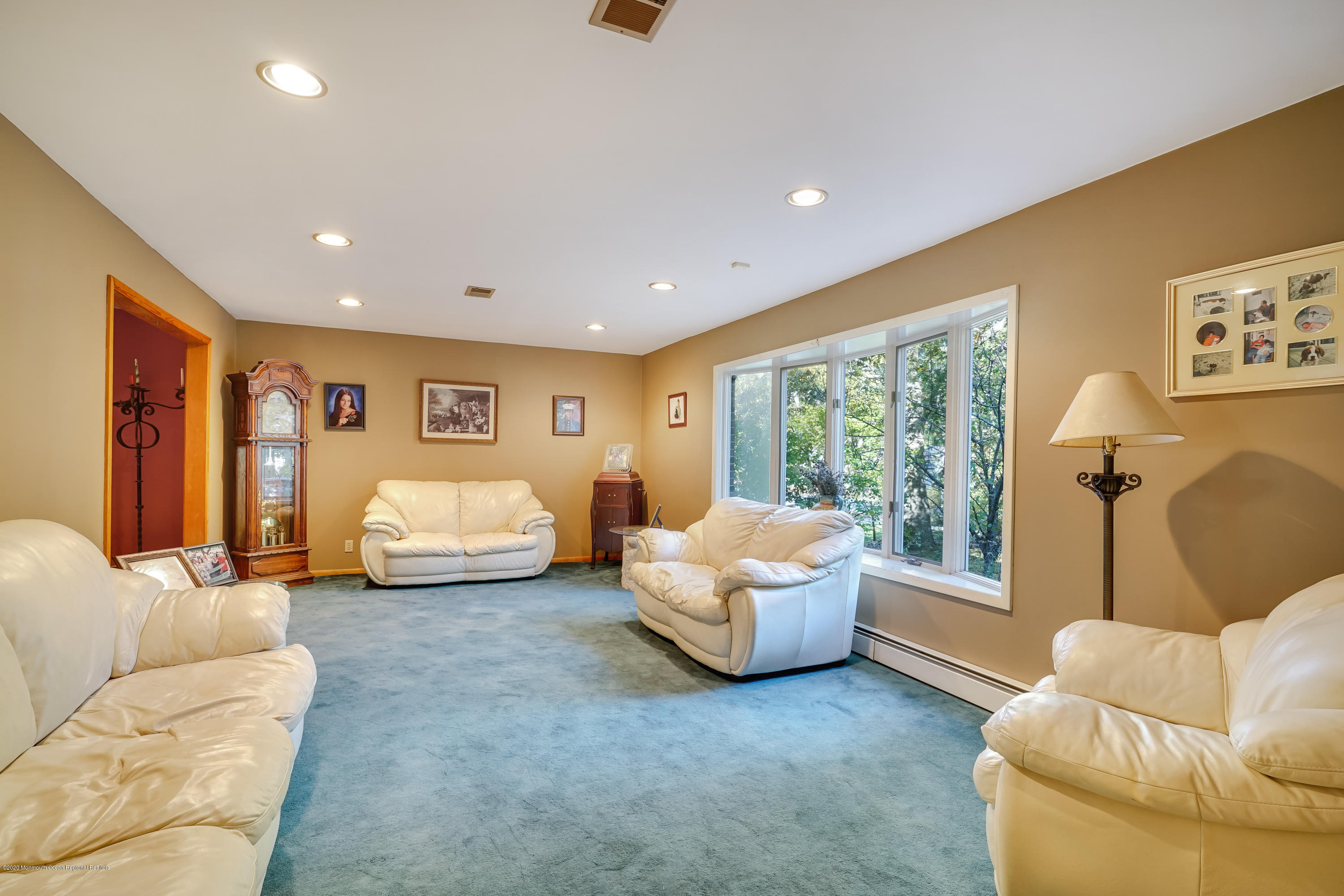 43 Korman Road Bayville, NJ 08721 - Photo 7 of 47 a bedroom with furniture and large window