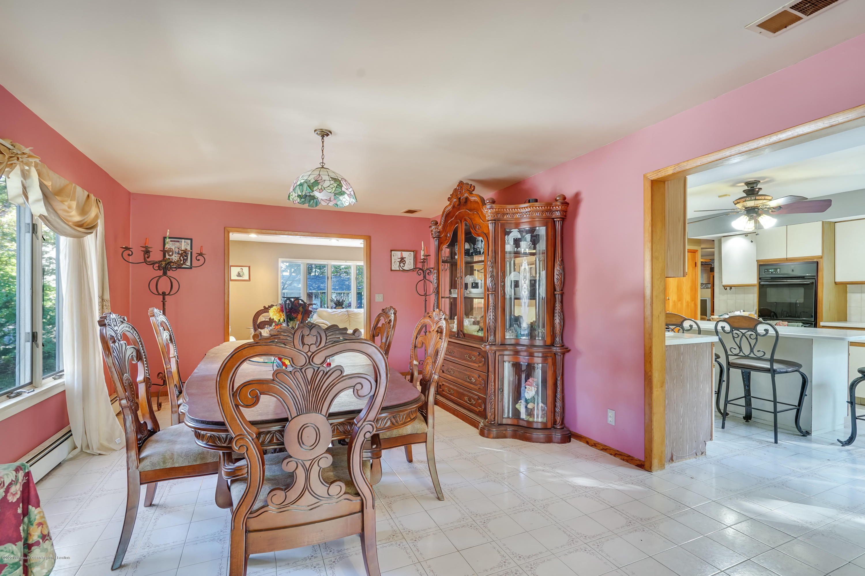 43 Korman Road Bayville, NJ 08721 - Photo 9 of 47 a view of a dining room with furniture and chandelier