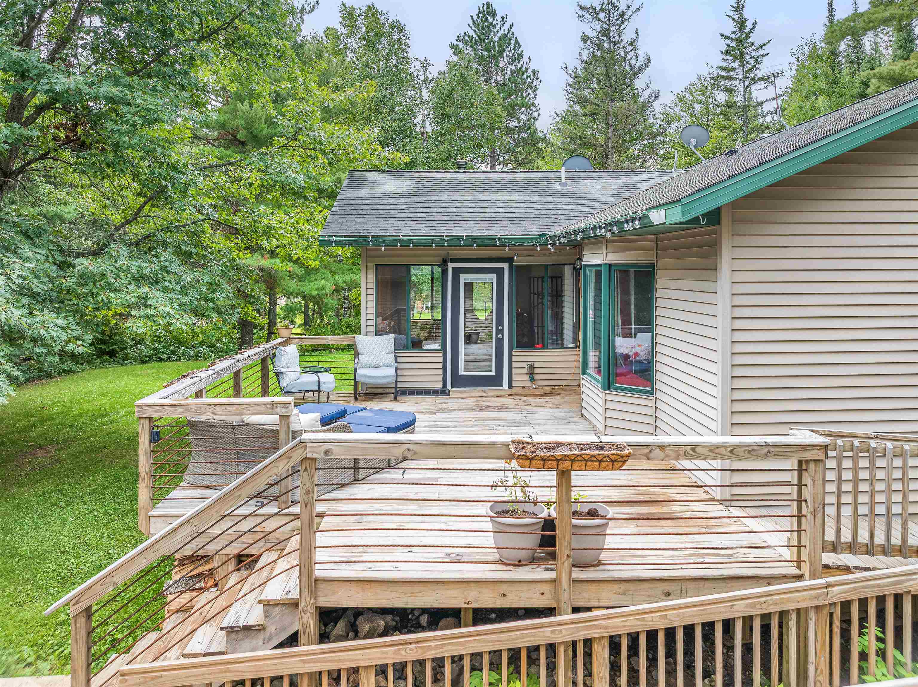 7345 Rahkola Road Embarrass, MN 55732 - Photo 23 of 57 Wooden deck featuring a yard and view of scattered trees