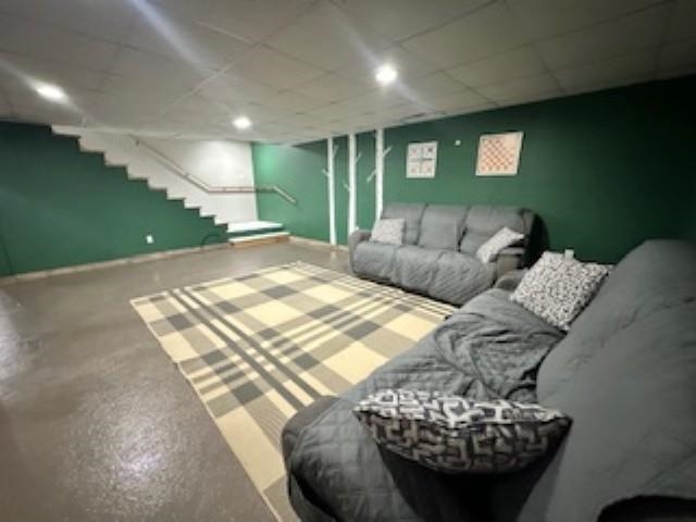 7345 Rahkola Road Embarrass, MN 55732 - Photo 54 of 57 Living room with stairs and a drop ceiling