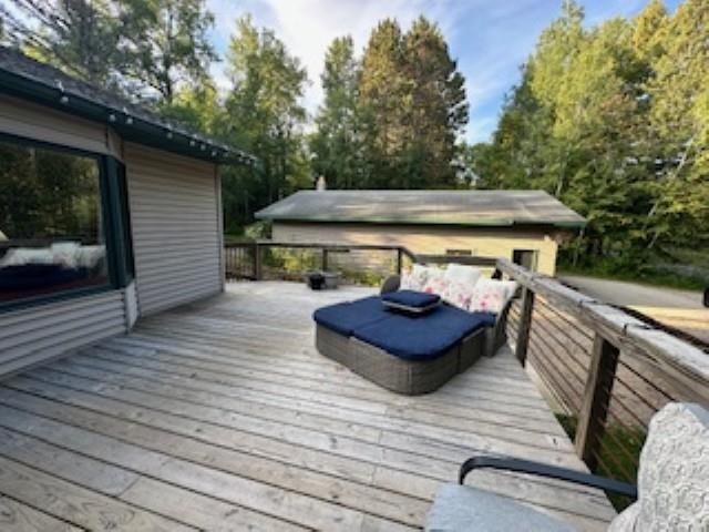 7345 Rahkola Road Embarrass, MN 55732 - Photo 6 of 57 Wooden terrace with view of scattered trees