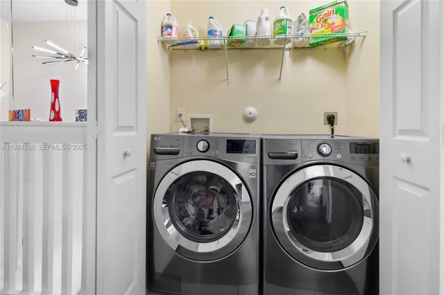 a utility room with dryer and washer