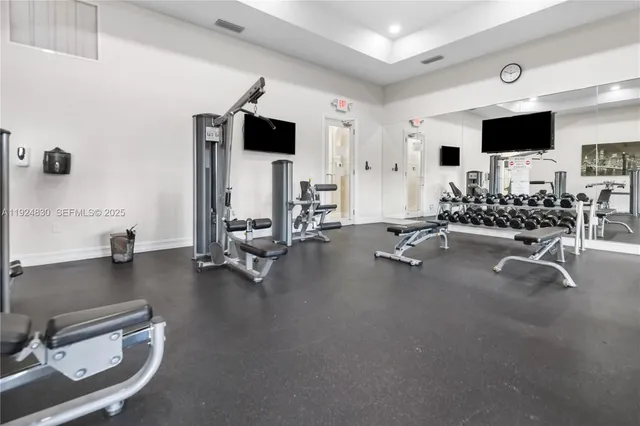 a view of a room with gym equipment