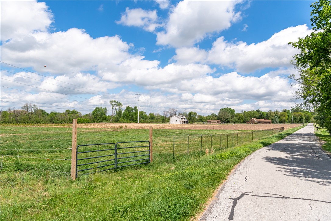 1095 Spring Valley-Alpha Road Xenia, OH 45385 - Photo 3 of 5 Expansive pastoral grounds await your vision, offering serene country living with endless possibilities.