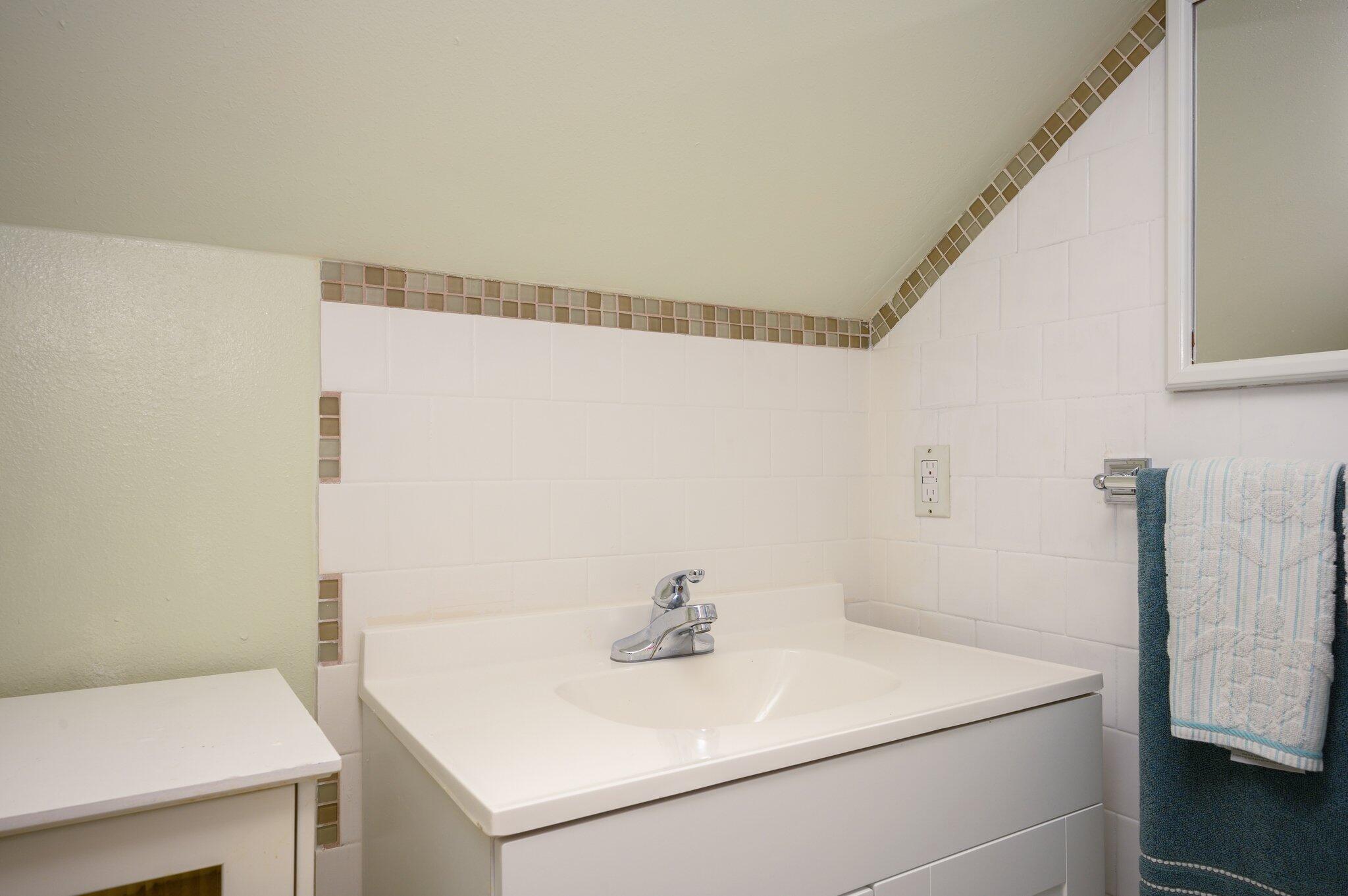 883 Squirrel Road DeFuniak Springs, FL 32433 - Photo 30 of 57 a bathroom with a sink and a vanity