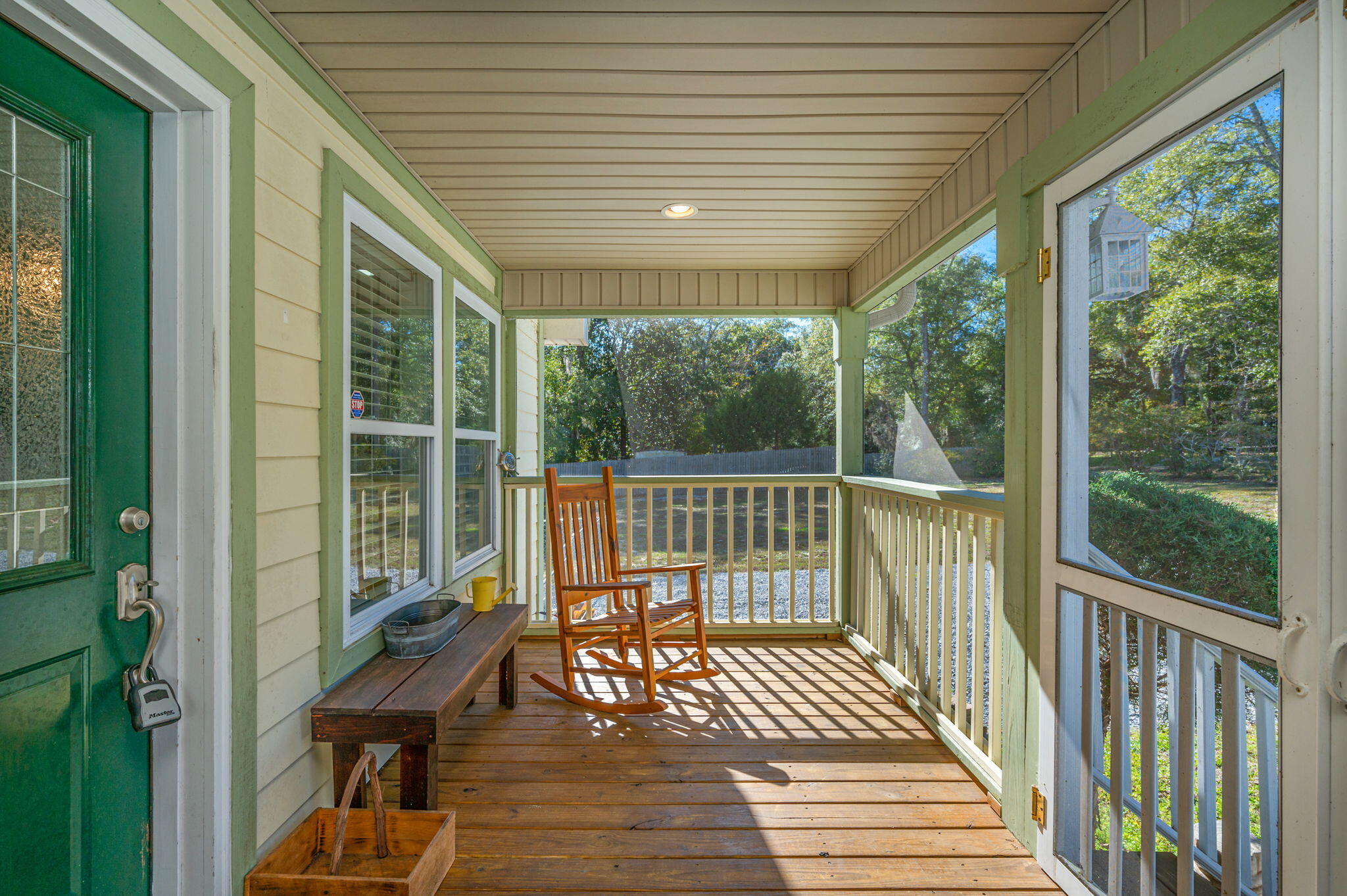 883 Squirrel Road DeFuniak Springs, FL 32433 - Photo 4 of 57 a view of a balcony with wooden floor