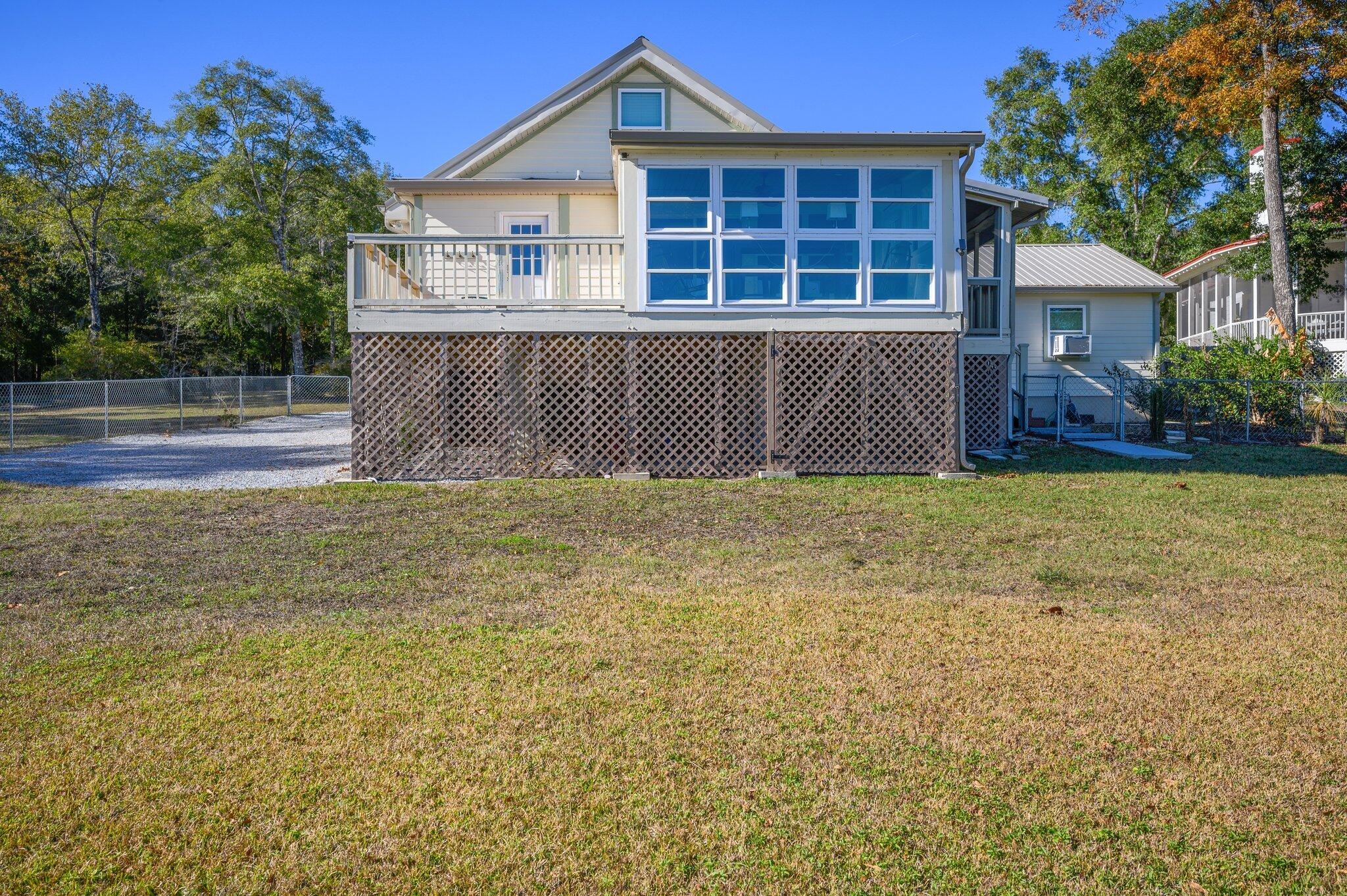 883 Squirrel Road DeFuniak Springs, FL 32433 - Photo 42 of 57 a view of front of house with a yard