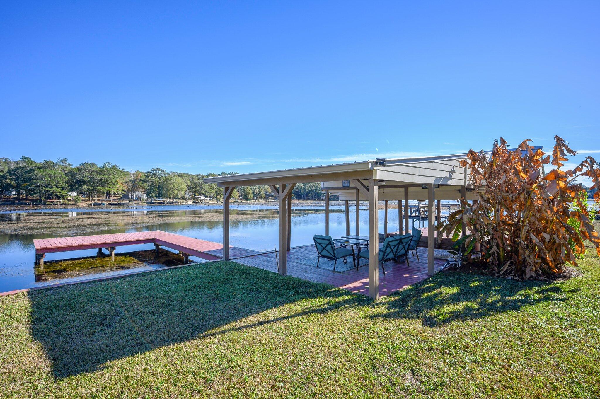 883 Squirrel Road DeFuniak Springs, FL 32433 - Photo 45 of 57 swimming pool view with a garden space