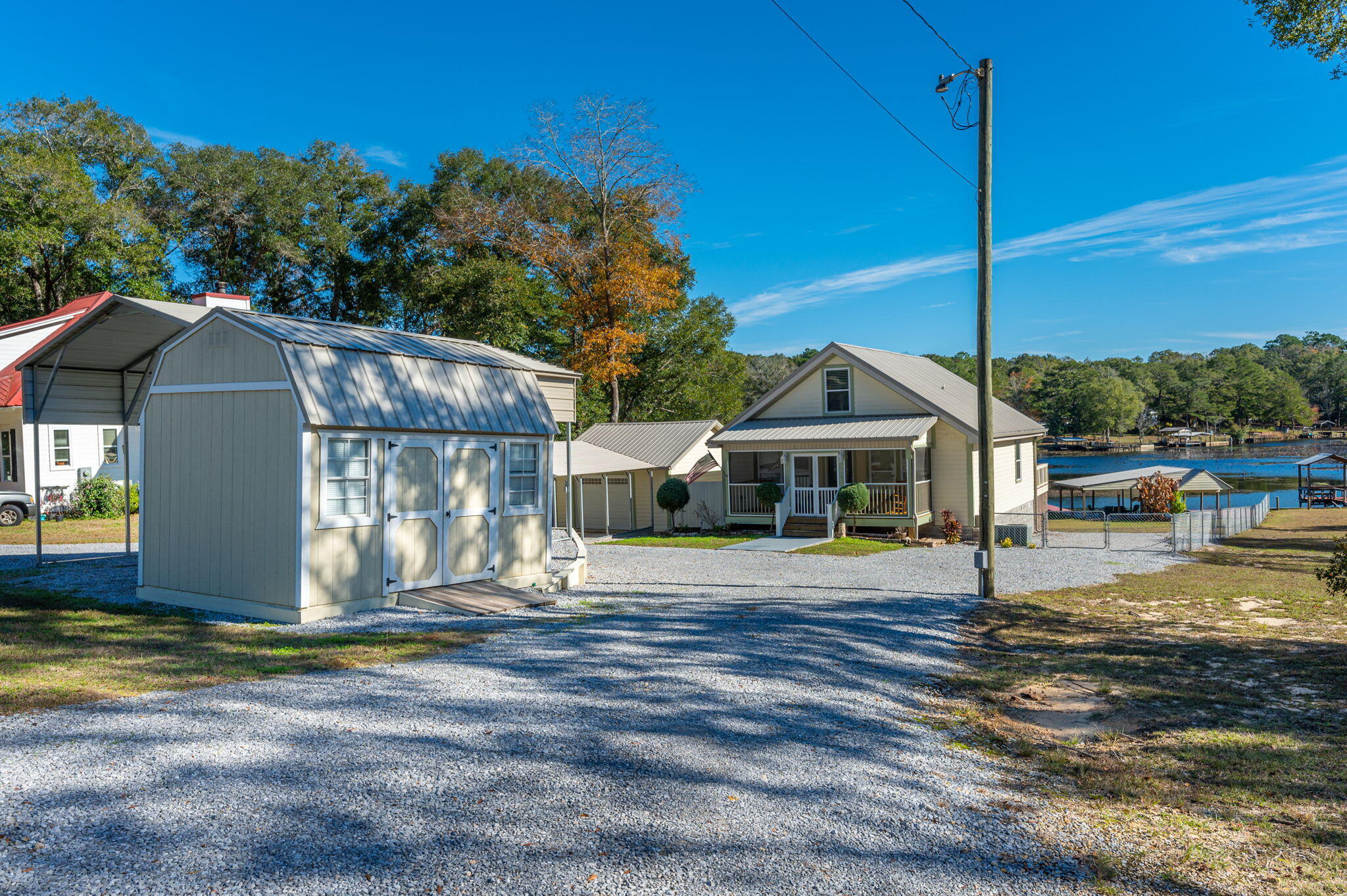 883 Squirrel Road DeFuniak Springs, FL 32433 - Photo 50 of 57 a front view of a house with a yard