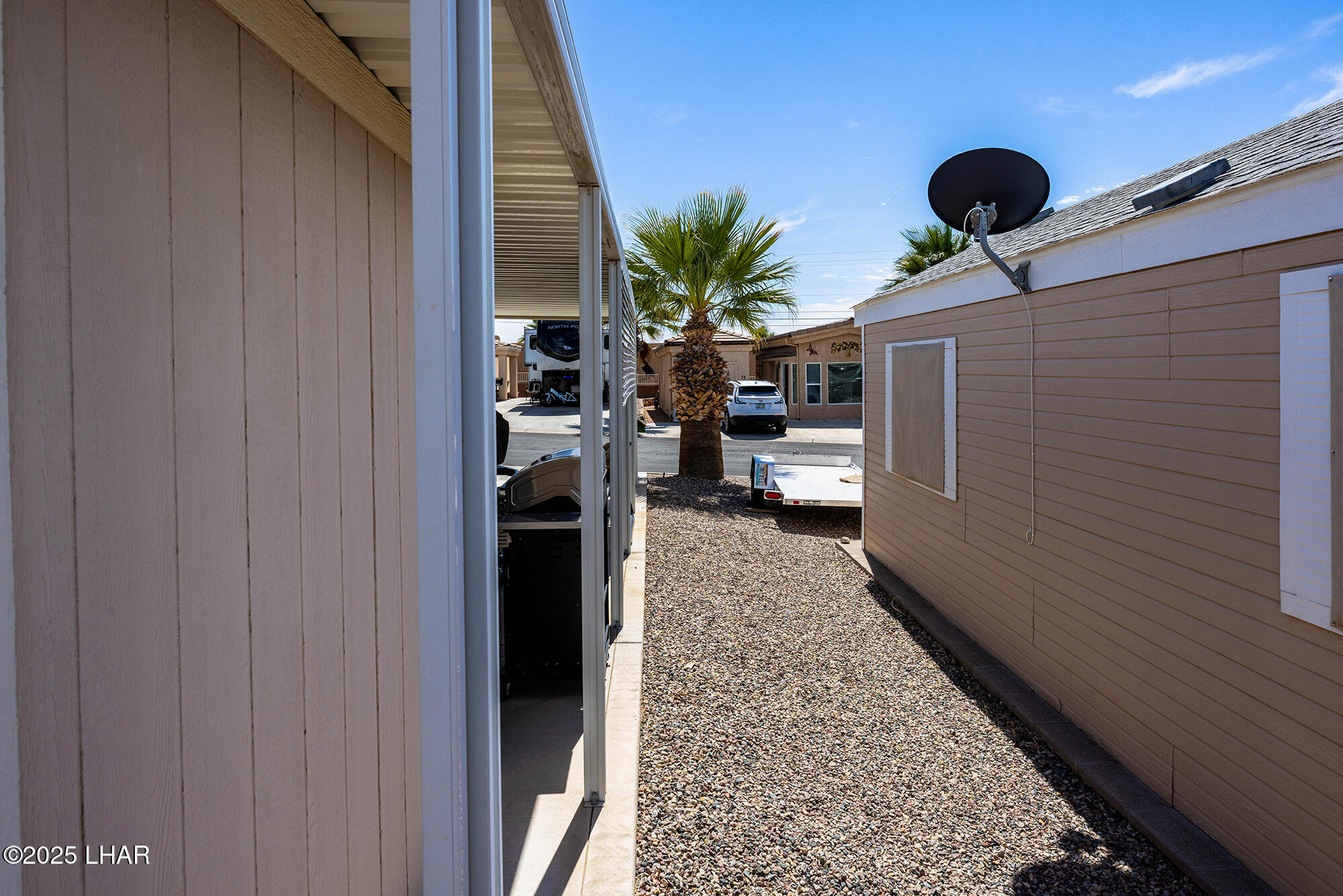 1905 Victoria Farms Road, Unit 92 Lake Havasu City, AZ 86404 - Photo 18 of 36 West Side of Property