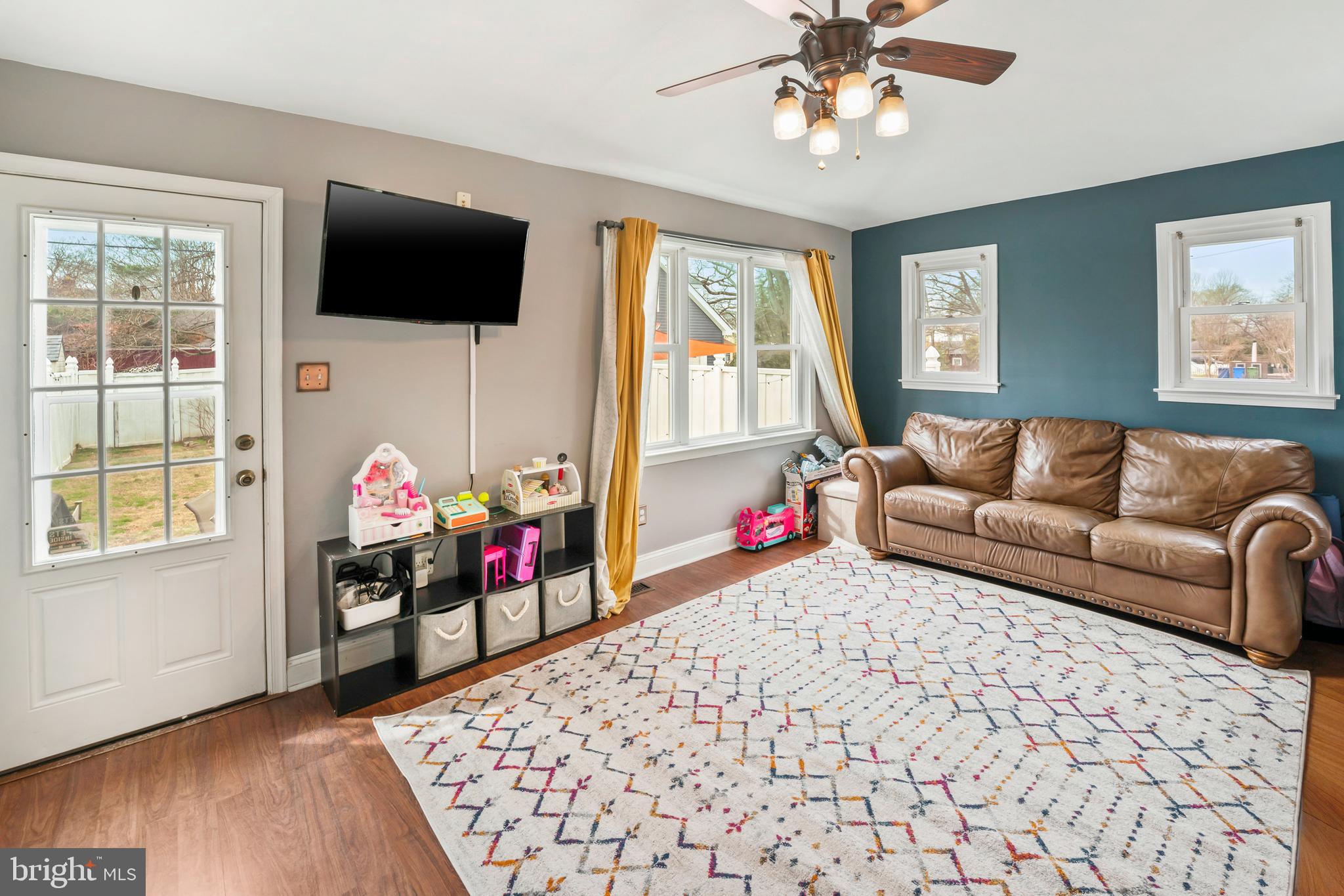 731 Washington Avenue Palmyra, NJ 08065 - Photo 15 of 40 a living room with furniture and a flat screen tv
