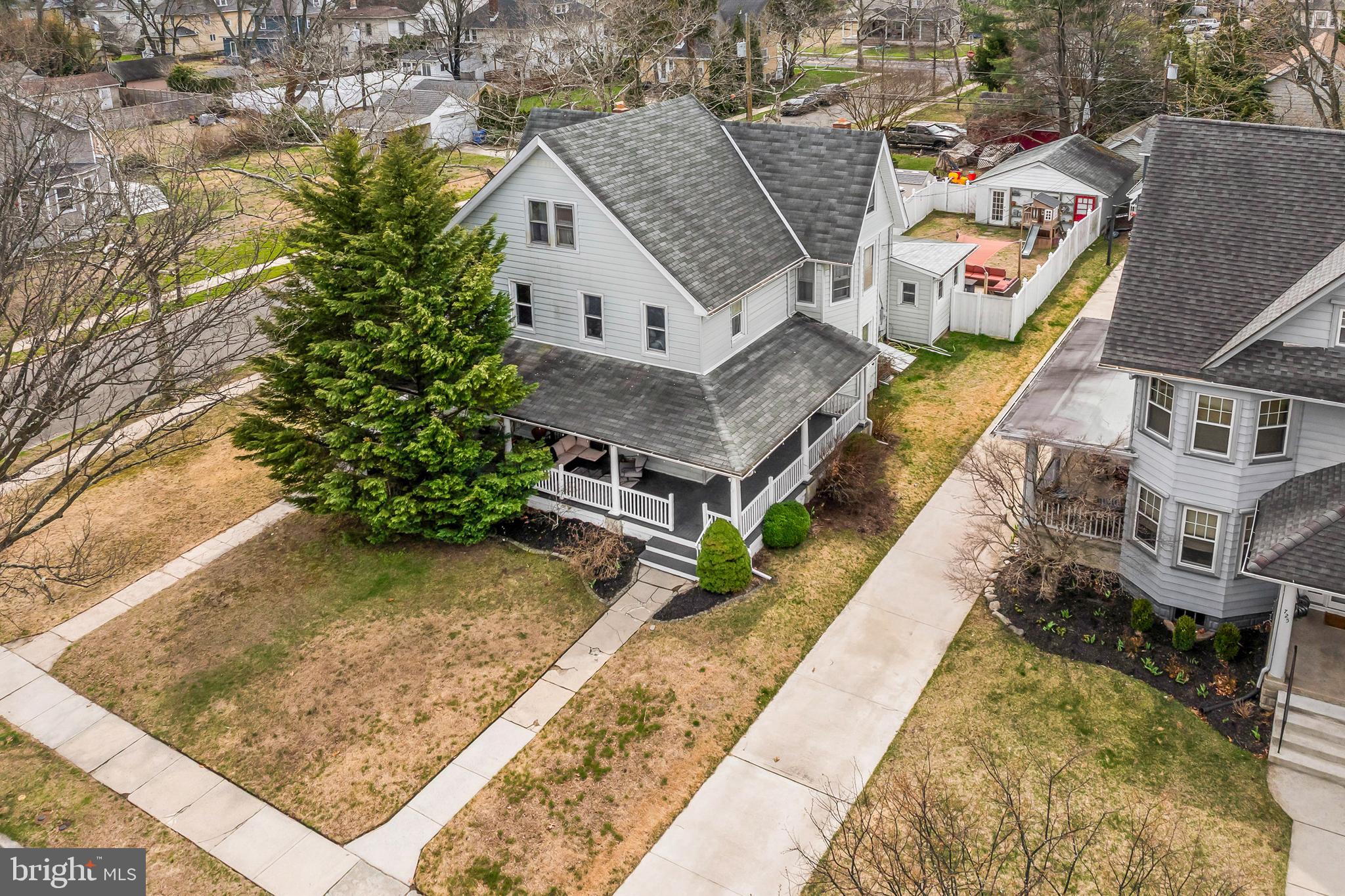 731 Washington Avenue Palmyra, NJ 08065 - Photo 3 of 40 an aerial view of a house with a yard