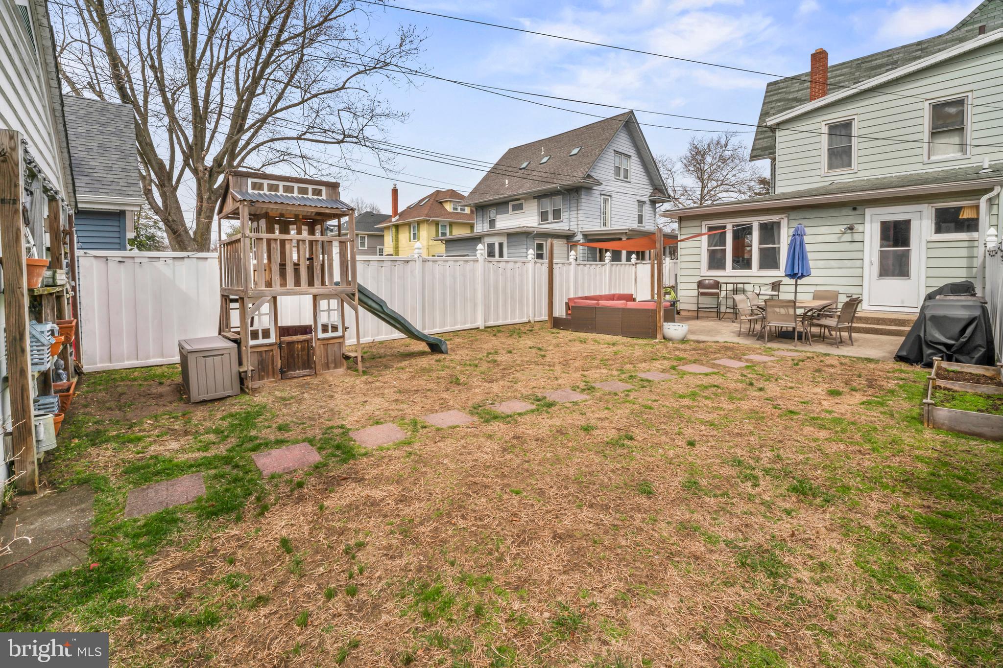 731 Washington Avenue Palmyra, NJ 08065 - Photo 31 of 40 a view of a house with a yard and sitting area