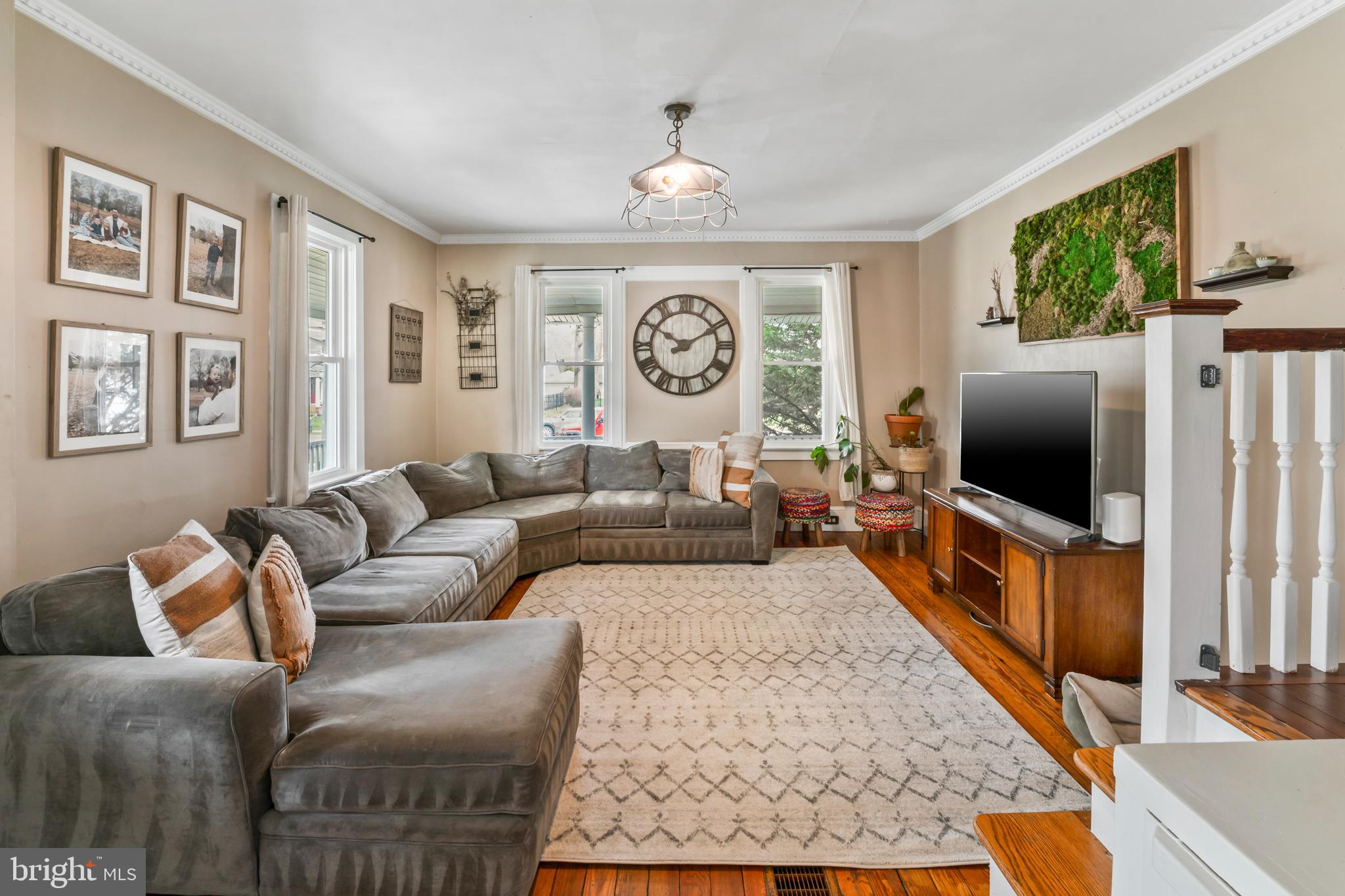731 Washington Avenue Palmyra, NJ 08065 - Photo 6 of 40 a living room with furniture and a flat screen tv
