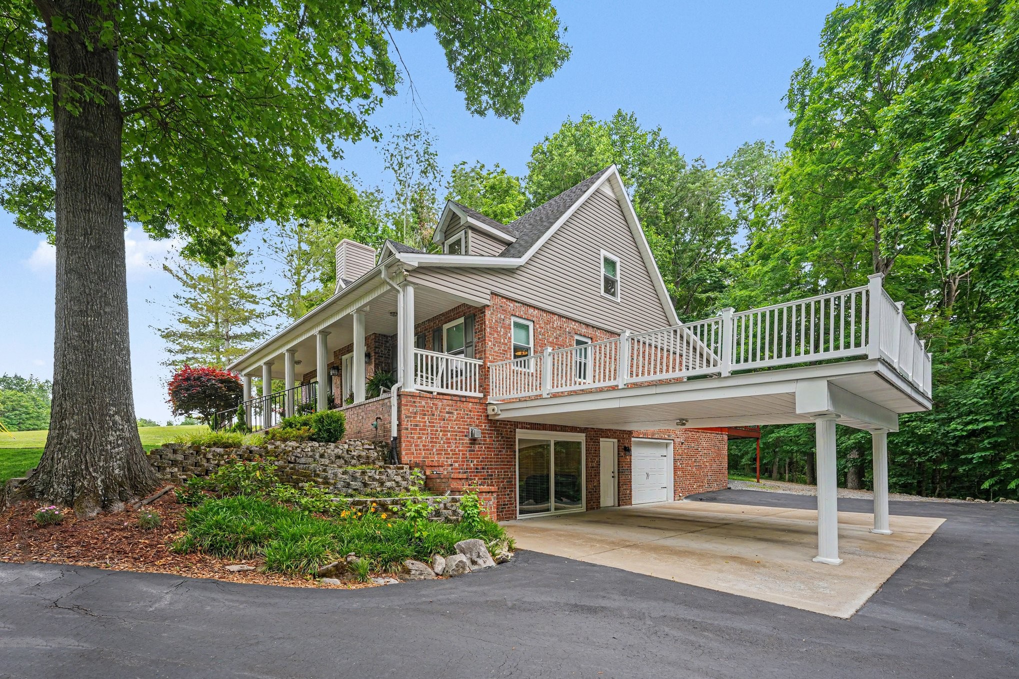 5833 Highway 76 East Springfield, TN 37172 - Photo 48 of 66 a front view of a house with garden