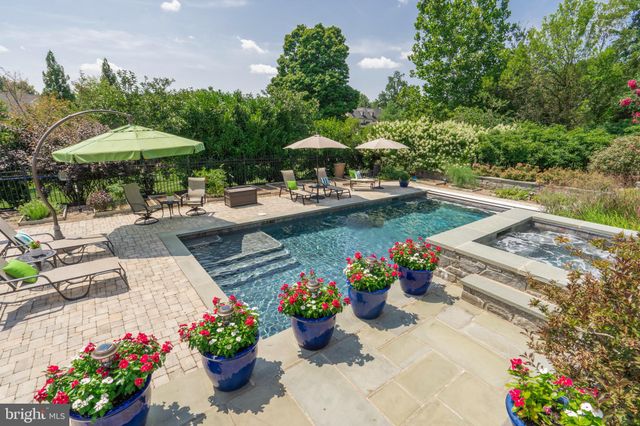 a living room with furniture rug and window