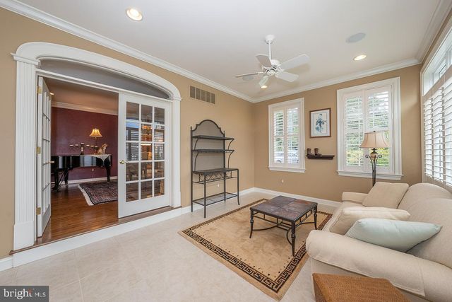 a view of a dining area with chandelier
