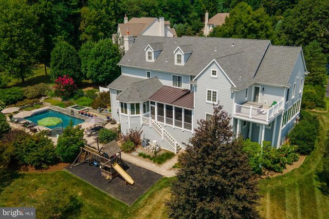 an aerial view of a house with a garden