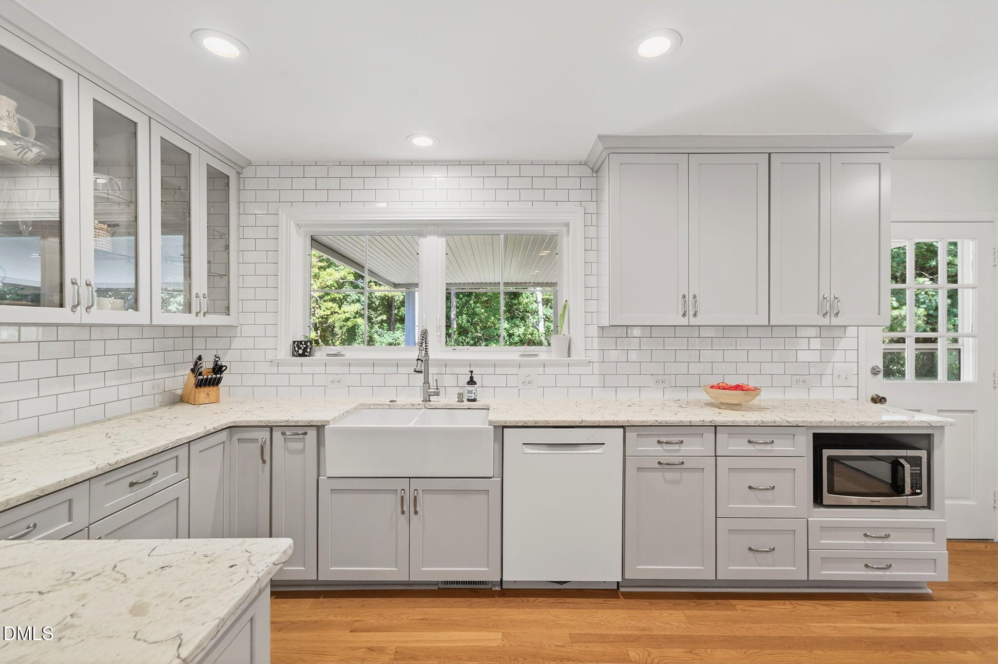 1112 Whippoorwill Lane Raleigh, NC 27609 - Photo 3 of 39 Updated Kitchen with Quartz Countertops