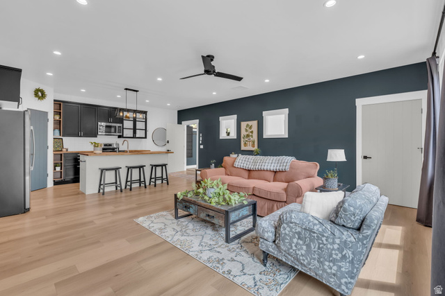 1766 West Tollgate Cyn Road Coalville, UT 84017 - Photo 29 of 59 Open-concept living area featuring light wood-finish flooring throughout