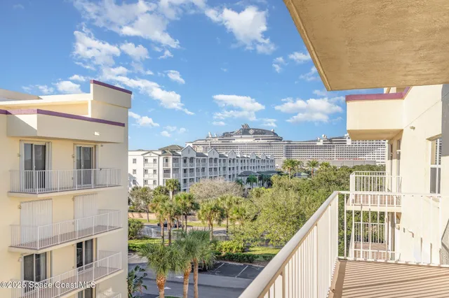 a view of a balcony with city view