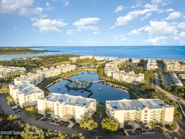 a view of a city and ocean