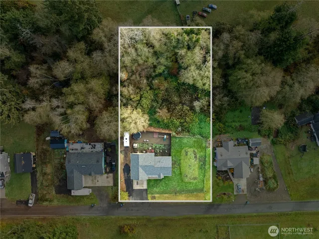 an aerial view of a house with garden