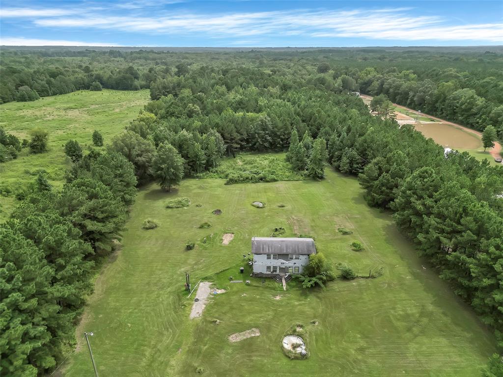 368 Sneed Road Waskom, TX 75692 - Photo 7 of 16 a view of a garden with a lake view
