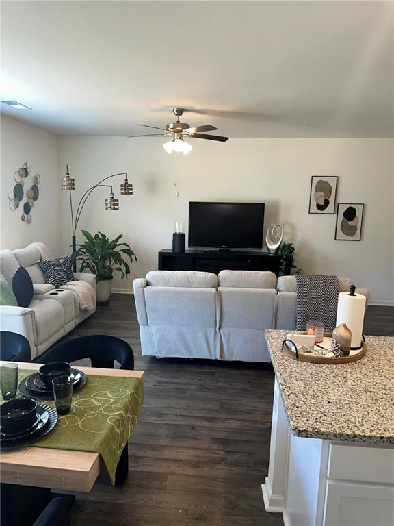 103 Hampton Street McDonough, GA 30253 - Photo 12 of 17 a living room with furniture and a flat screen tv