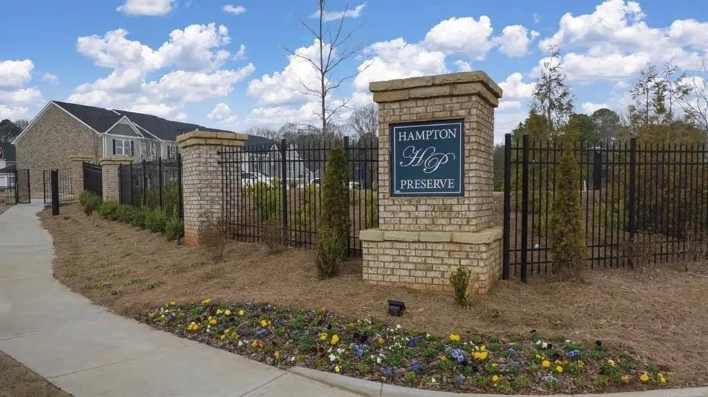 103 Hampton Street McDonough, GA 30253 - Photo 2 of 17 a front view of a house with a yard