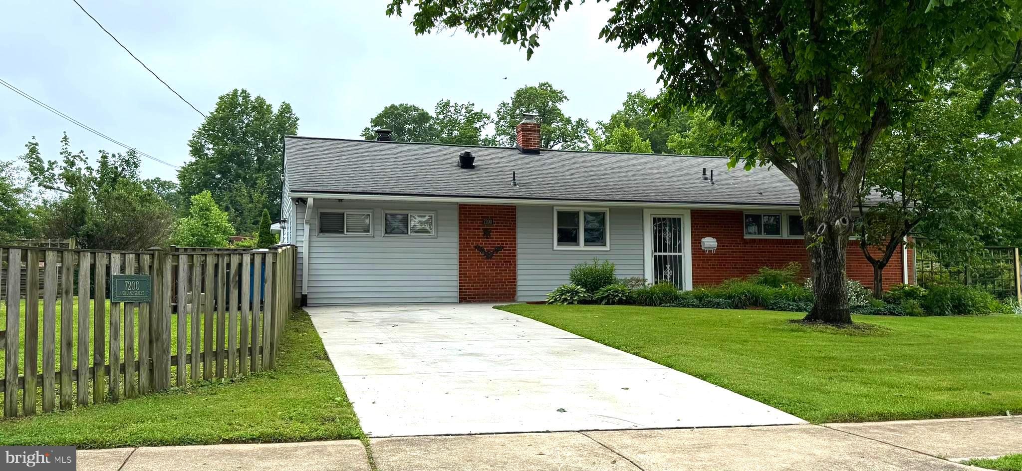 7200 Highland Street Springfield, VA 22150 - Photo 22 of 29 a view of a house with a yard