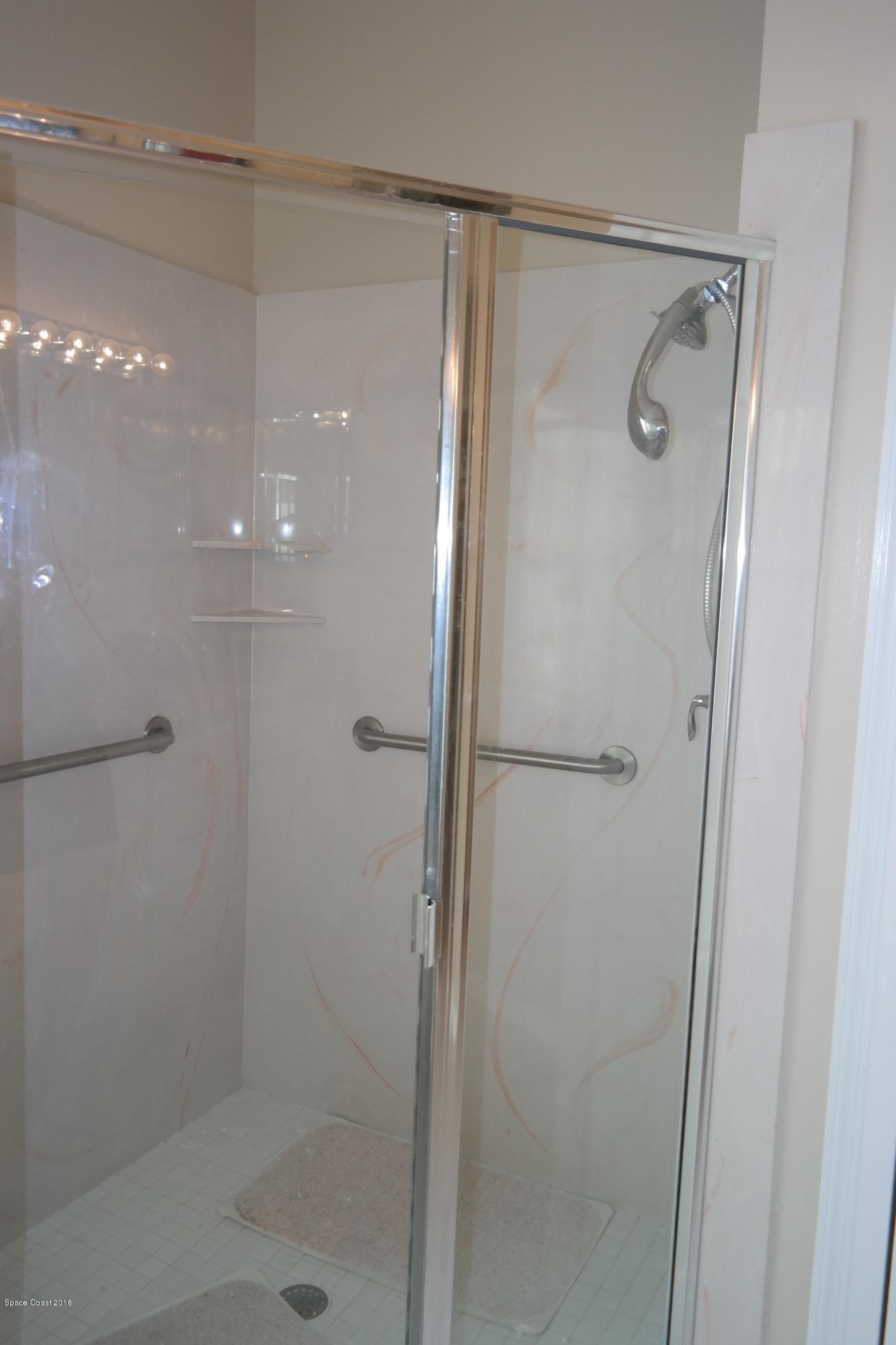 3370 Holly Springs Road Melbourne, FL 32934 - Photo 23 of 27 Walk in Shower with 2 Shower Heads