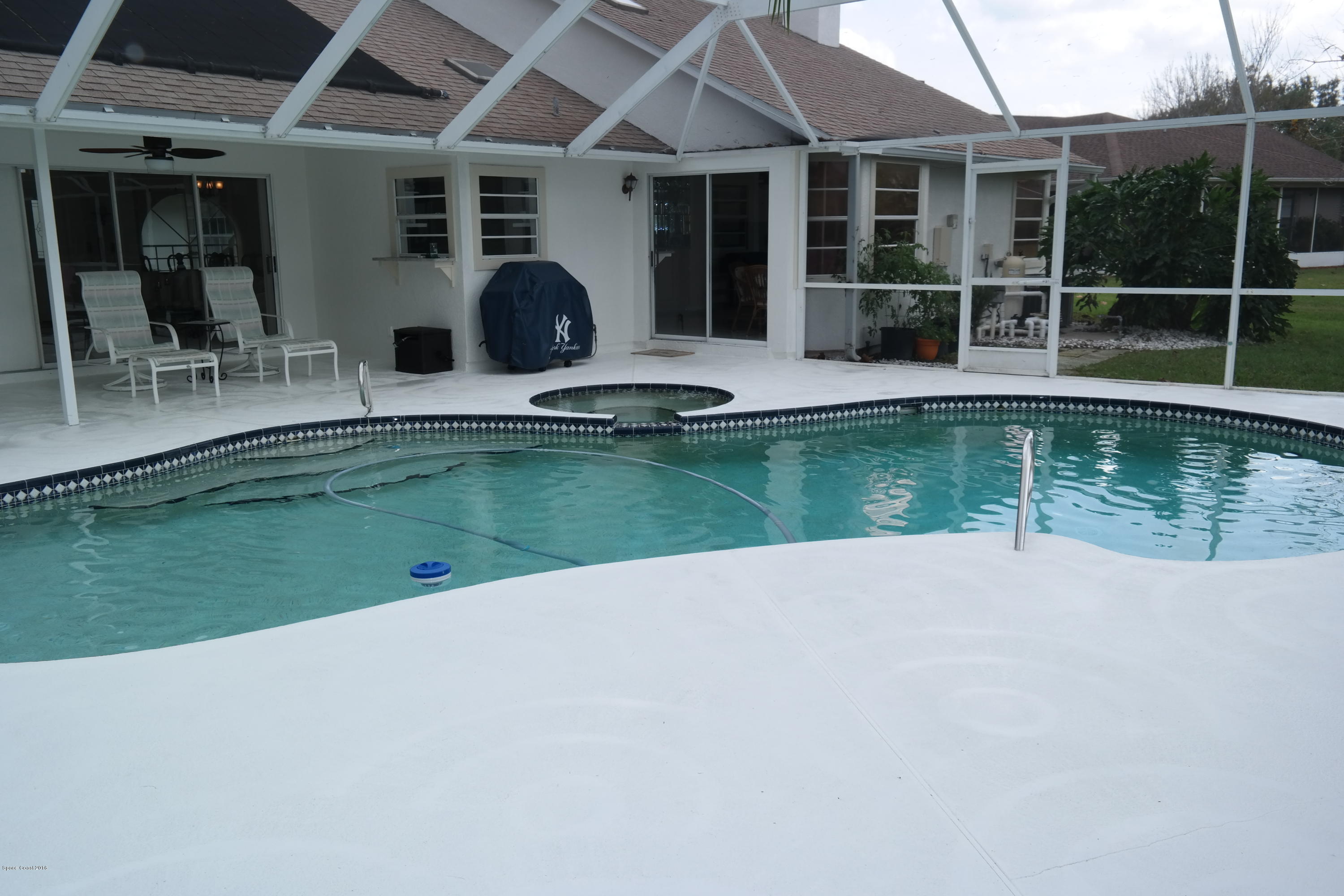 3370 Holly Springs Road Melbourne, FL 32934 - Photo 27 of 27 Pool + Hot Tub + Lake = FUN!