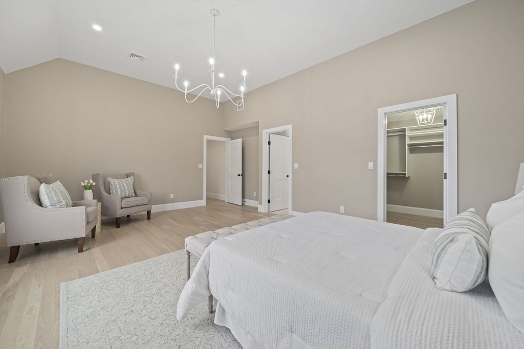 45 Red Gold Farm Road Marshfield, MA 02050 - Photo 17 of 40 a spacious bedroom with a bed and couch