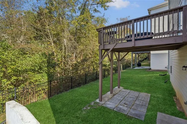 a view of a yard with a deck