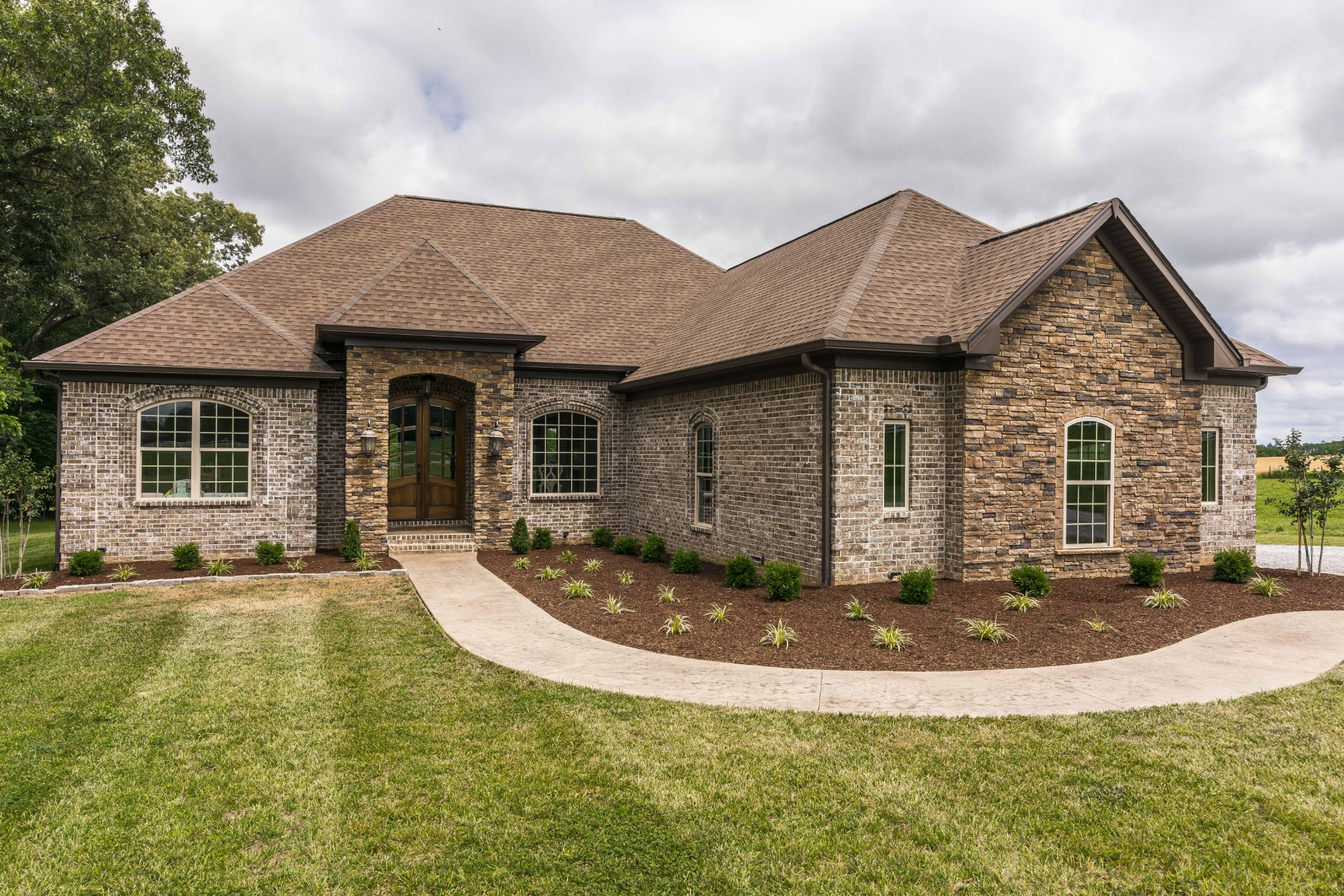 a view of a house with roof yard