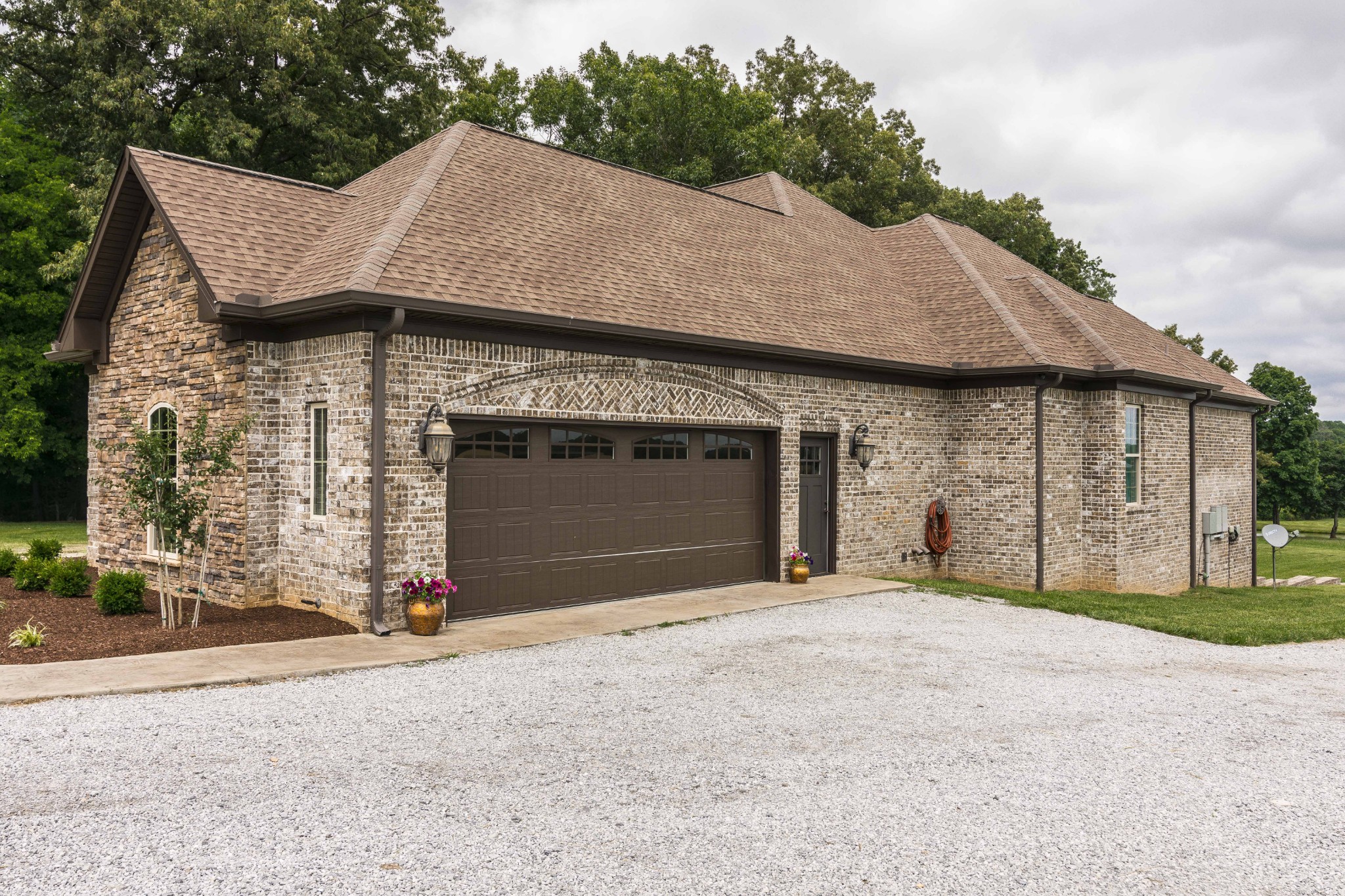 4294 Dot Road Springfield, TN 37172 - Photo 3 of 50 a front view of a house with a yard and garage
