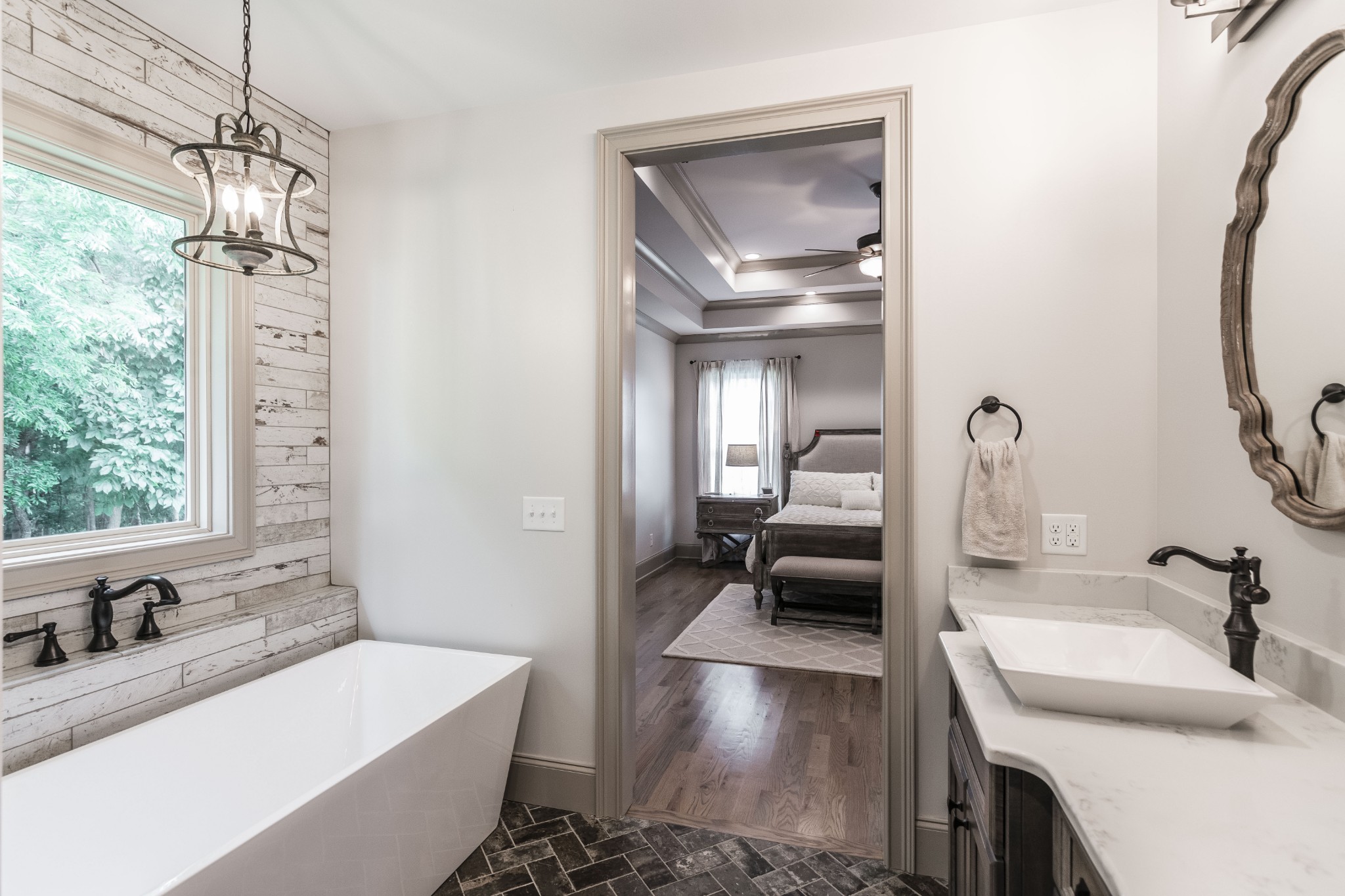 4294 Dot Road Springfield, TN 37172 - Photo 39 of 50 a en suite bathroom with a tub double sink and glass door