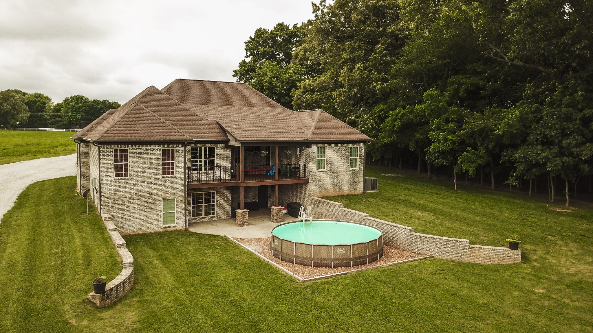 4294 Dot Road Springfield, TN 37172 - Photo 6 of 50 a aerial view of a house with swimming pool and a yard