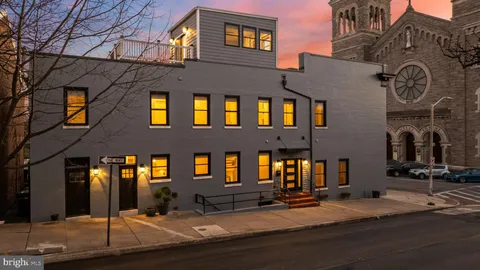 a front view of a house with yard