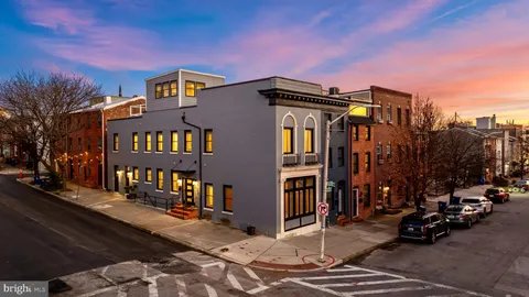 a car parked in front of a building