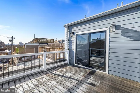 a bathroom with a sink a toilet and a bathtub