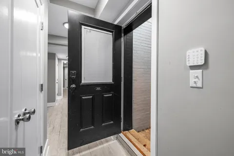 a view of a city street from a balcony