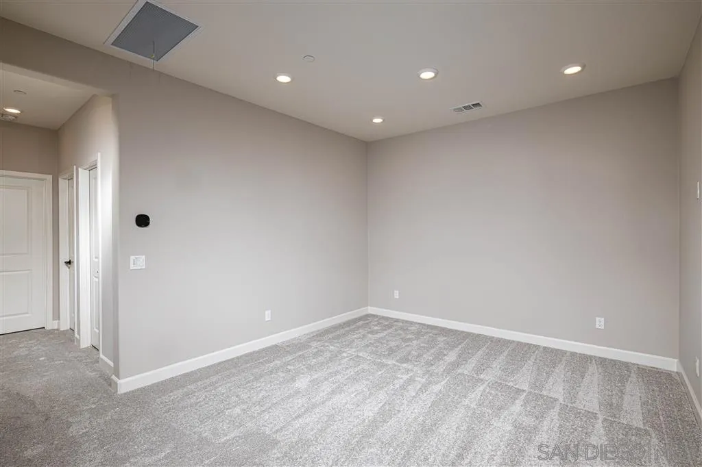 1174 Delpy View Point, Unit 102 Vista, CA 92084 - Photo 11 of 17 a view of empty room
