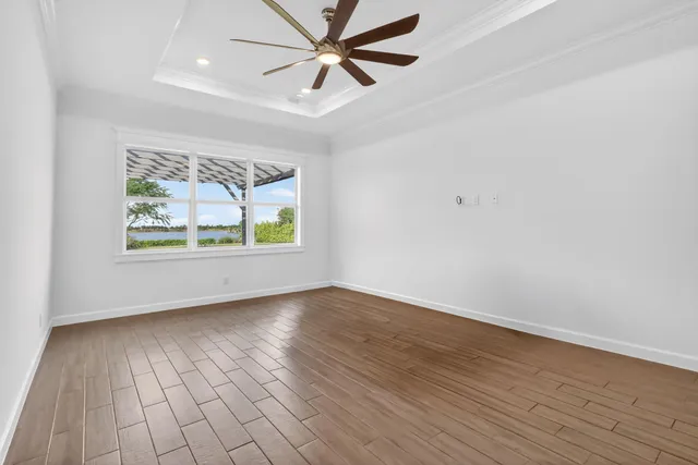 a view of a house with a backyard and a patio